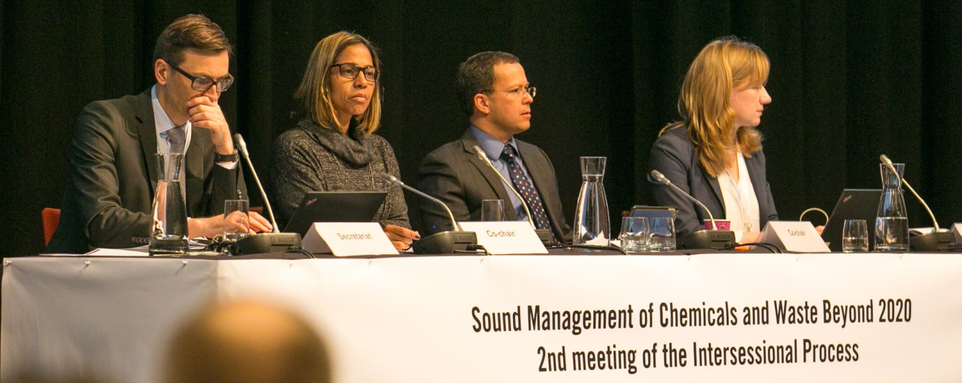 A panel of four persons on a podium at the SAICM 2020 conference