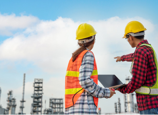 Refinery industry engineer wearing PPE Working at refinery construction site