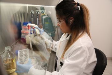 a woman in a lab coat