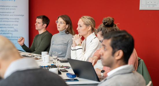 Students listening in Course