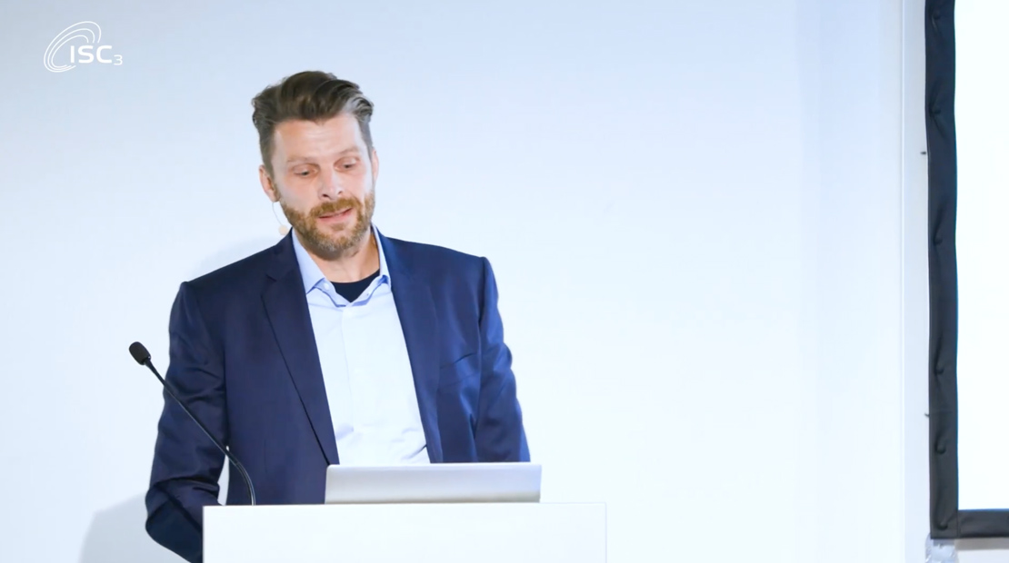 Man presenting in front of audience