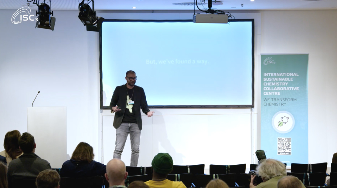 Man presenting in front of audience
