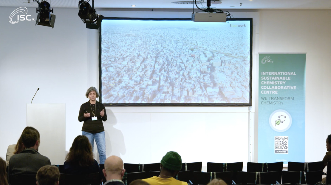 Woman presenting in front of audience