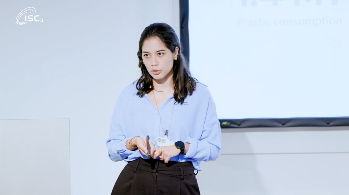Woman presenting in front of audience
