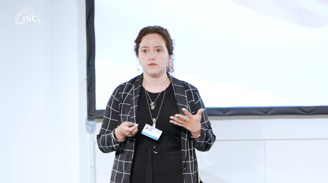 Woman presenting in front of audience