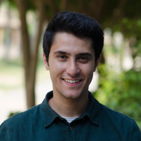 Picture of Abdallah Mohamed, founder of Plastale. Man smiling at camera with trees in the background.