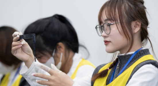 women inspecting in a factory